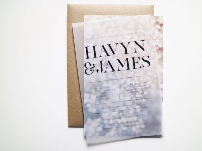 Vellum layered photo invitation baby's breath